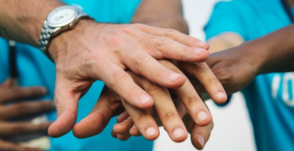 Doctors with their hands in