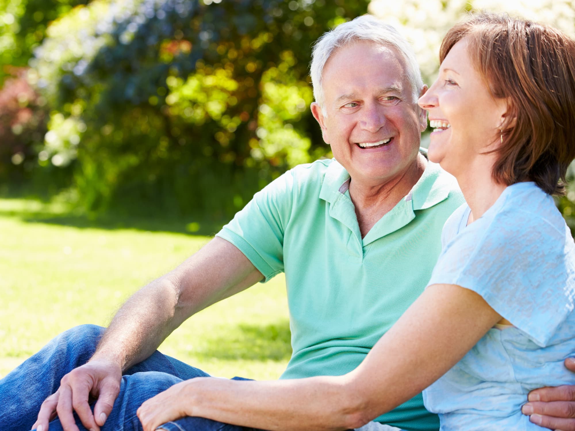 Senior couple sitting outside