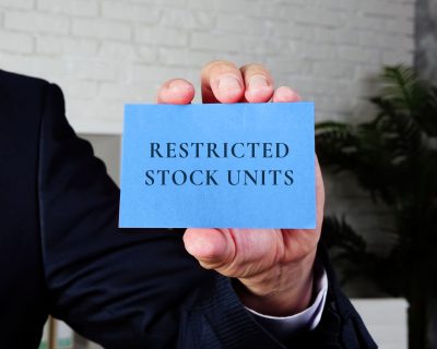 Business concept about Restricted Stock with sign on the piece of paper.